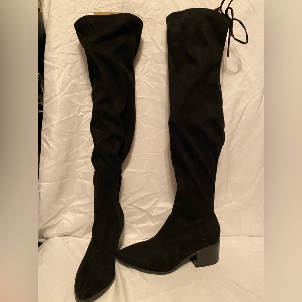 Expression black over the knee boots